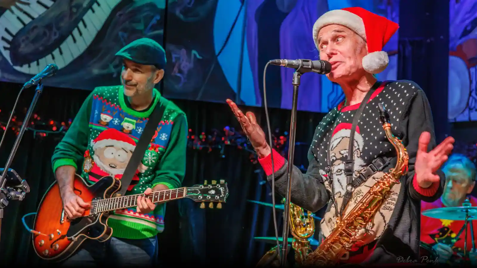 Ugly Christmas Sweater Blues Show with Peter Moss & Kevin Selfe at Blue Diamond PDX Ugly Christmas Sweater blues show at Blue Diamond PDX in Portland. Saxophonist Peter Moss in Santa hat and guitarist Kevin Selfe performing live on stage.